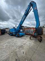 O & K umschlagbagger MH8.6T - O & K LKWs