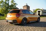 BMW F20 M135i Sport 8-Fach Garantie TüV Checkheft - BMW mit Benzin-Antrieb: Orange