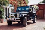 Jeep Wrangler Sahara 4.0 mit Dachträger - gebrauchte Jeep Wrangler aus dem Jahr 2000