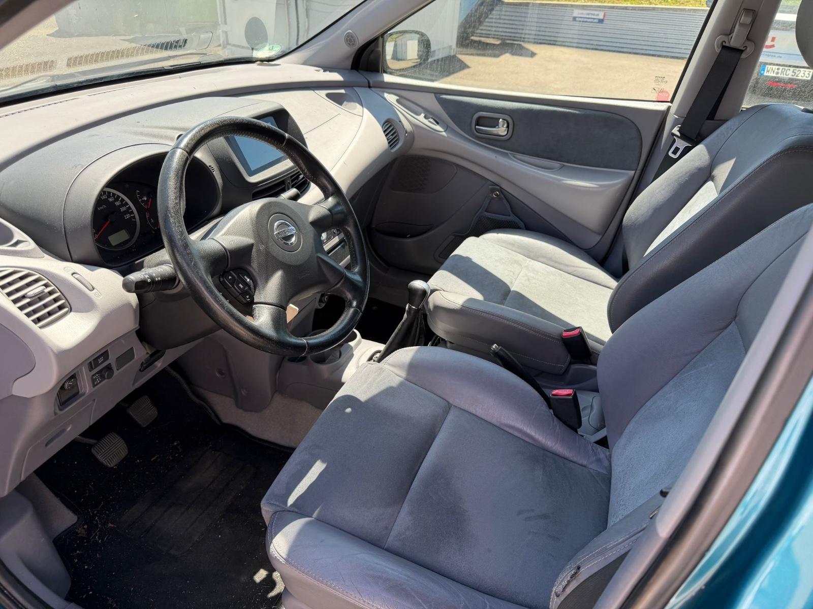 Nissan Almera 2005 — photo 31