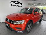 Volkswagen Tiguan 1.4 TSI Sound Navi|2*PDC|Klimaaut.|2.Hand - mit Benzin-Antrieb: Orange, Geländewagen