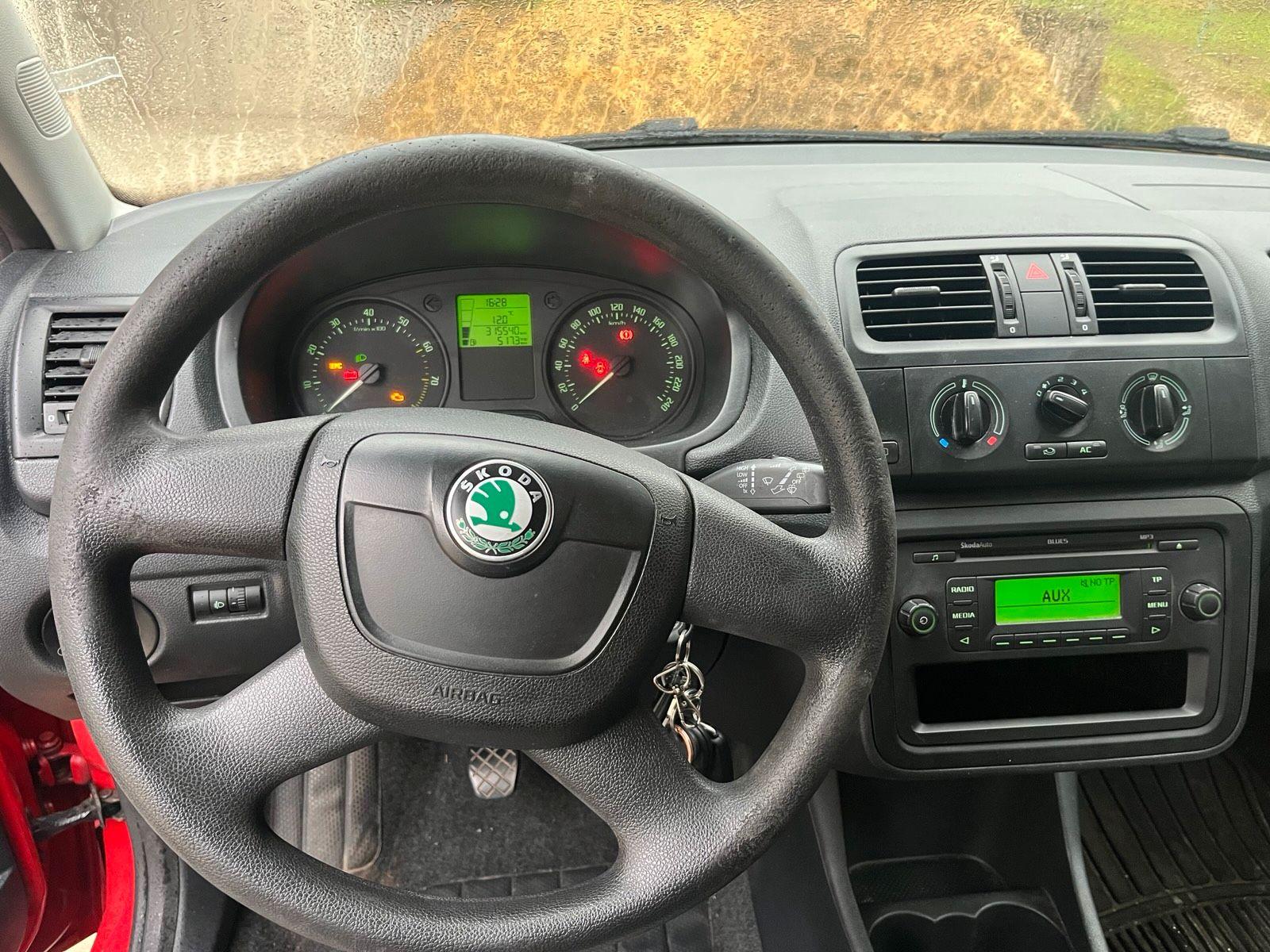 Skoda Fabia 2012 — photo 11