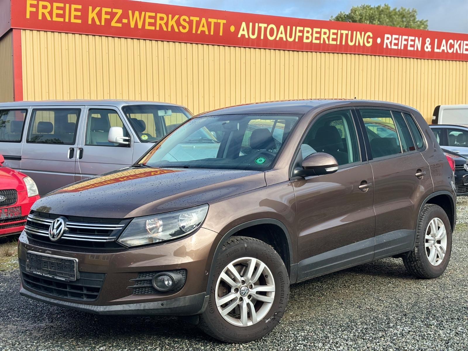 Volkswagen Tiguan  1-HAND,SCHECKHEFT-Voll,8xBereift,AHK,TÜV
