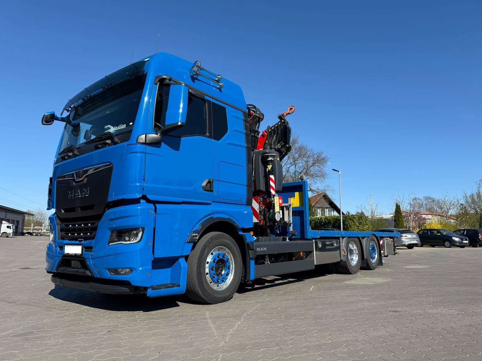 Fahrzeugabbildung MAN TGX 26.640 mit Fassi F365A2.26 Containerpritsche