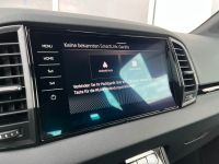 Skoda Karoq 1.5 TSI DSG Sportline PANO KAM AHK 4JGAR bei Autohaus Landmann & Maier OHG