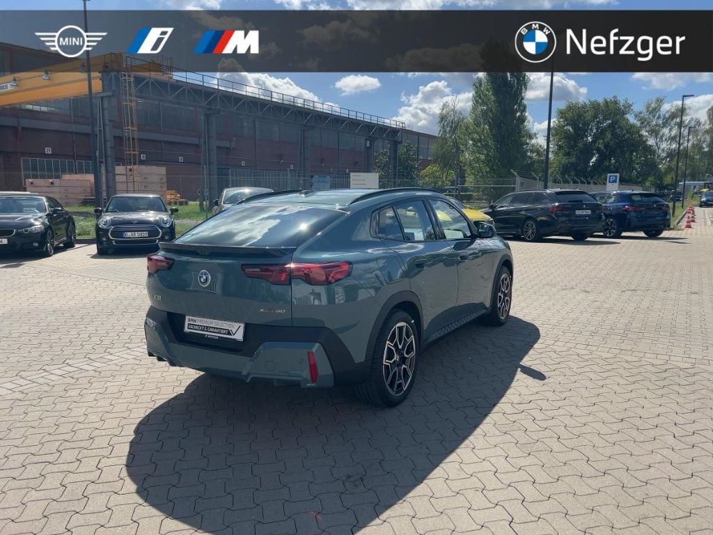 BMW iX2 xDrive 30 PANO LED HUD Iconic Glow 360° foto 4