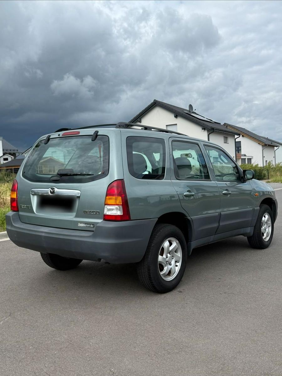 Mazda Tribute 2005 — engine 124 HP (91kW)