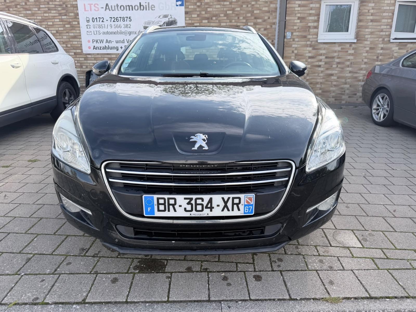 Peugeot 508 2011 — вигляд ззаду