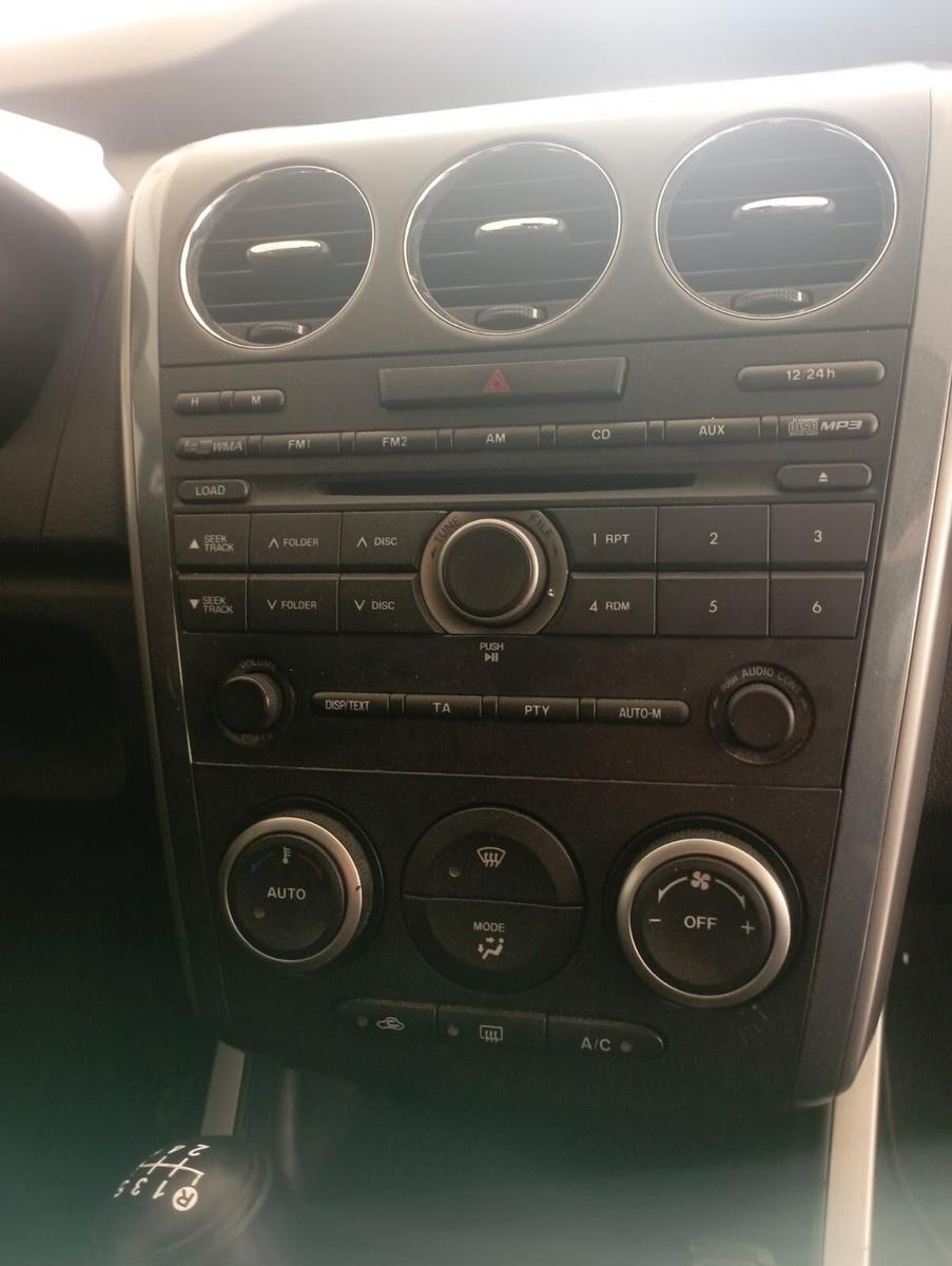 Mazda CX-7 2010 — photo 11