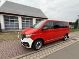 Volkswagen T6.1 Caravelle,DSG,Navi,Standheiz,Feuerrot R3000 - gebrauchte VW T6 Caravelle aus dem Jahr 2024