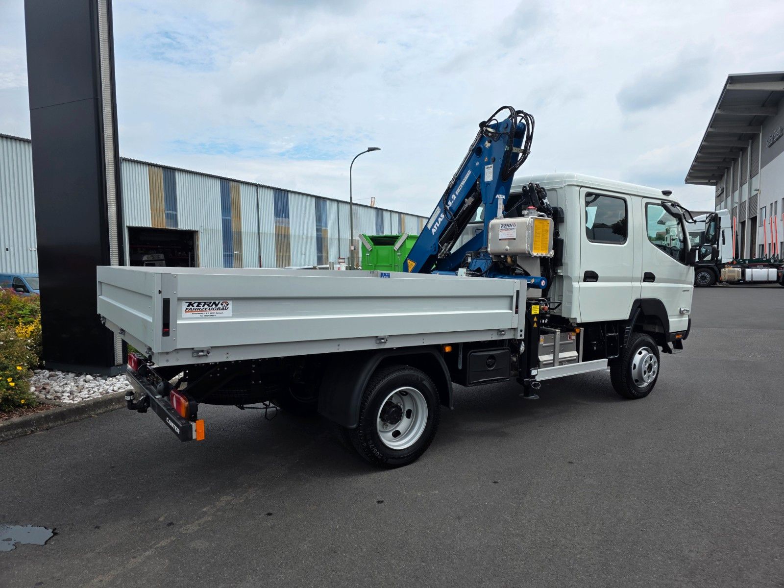Fahrzeugabbildung Mitsubishi Fuso Canter 6C18D DoKa 4x4 Kran Atlas 65.2 - A2