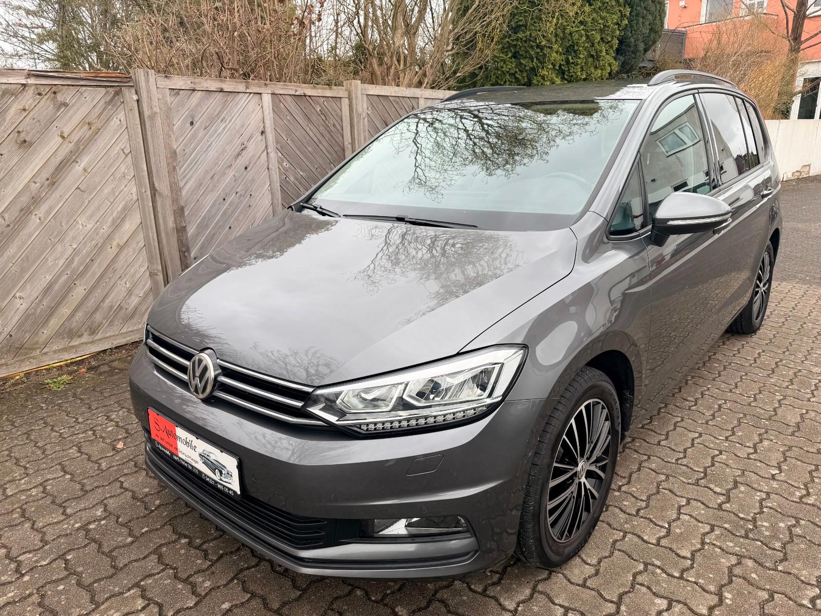 Volkswagen Touran Comfortline°7-Sitzer°Navigation°Xenon