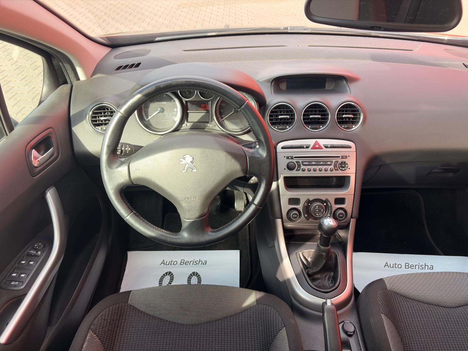Peugeot 308 2012 — photo 16