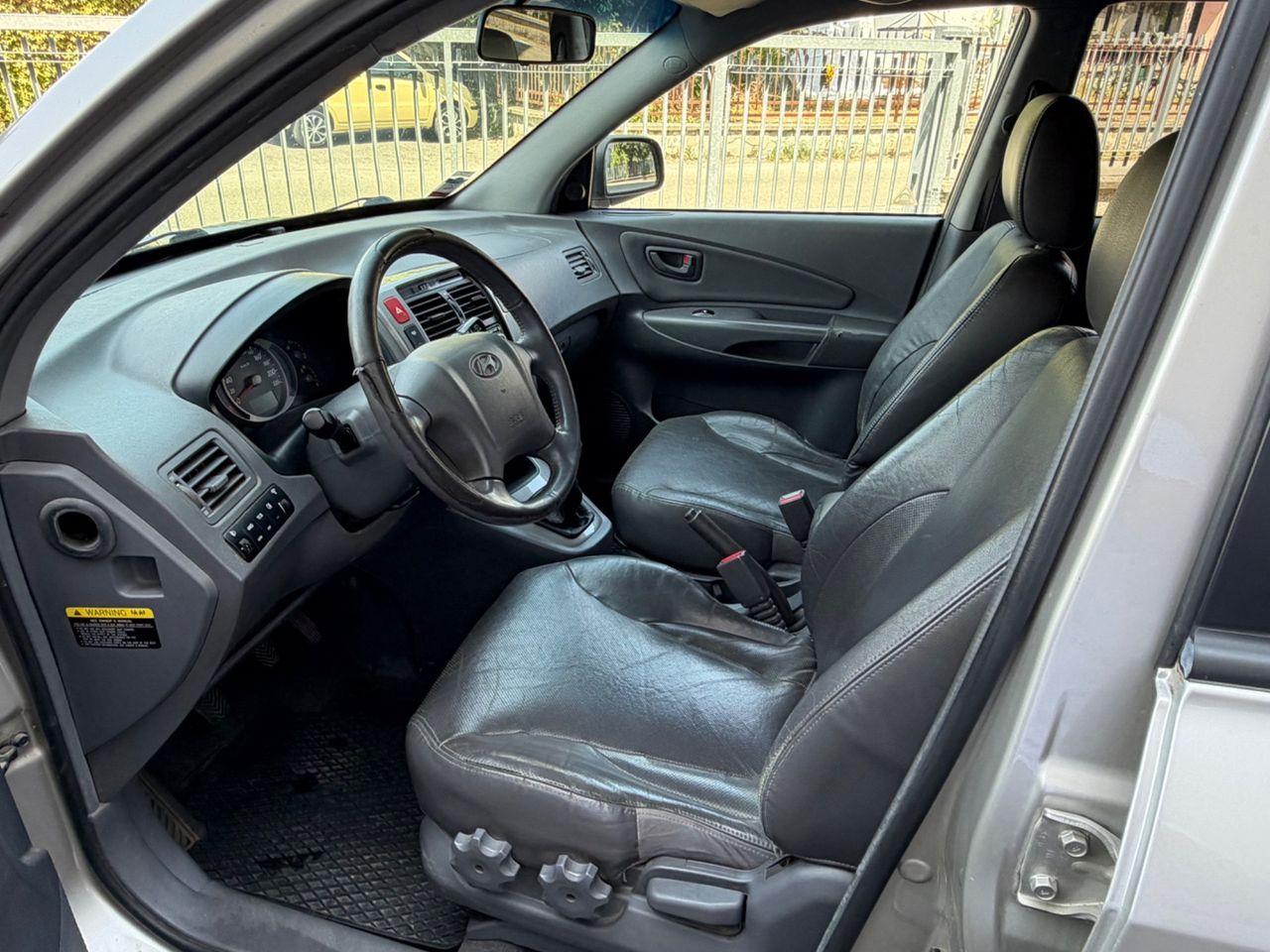 Hyundai Tucson 2006 — engine 1.991 cm³, 113 HP (83kW)