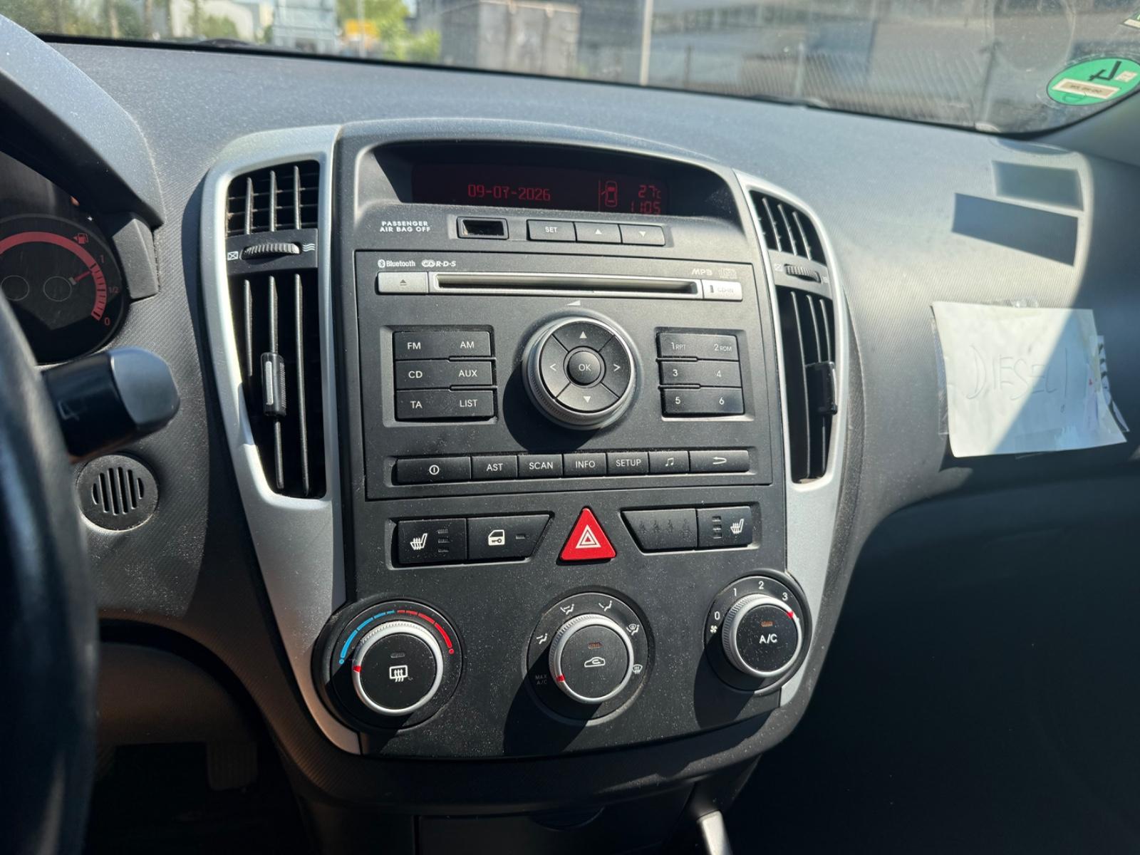 Kia cee'd 2012 — photo 12