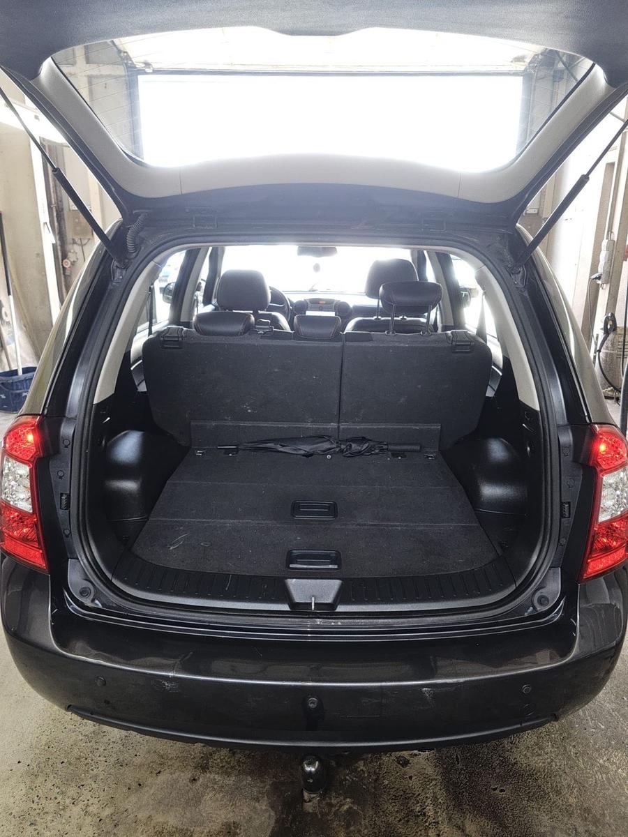 Kia Carens 2009 — photo 8