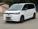 Volkswagen T7 Multivan 2.0 TDI BULLI DSG *1 HAND *LED*TISCH - Volkswagen T7 Multivan mit Diesel-Antrieb: Weiß