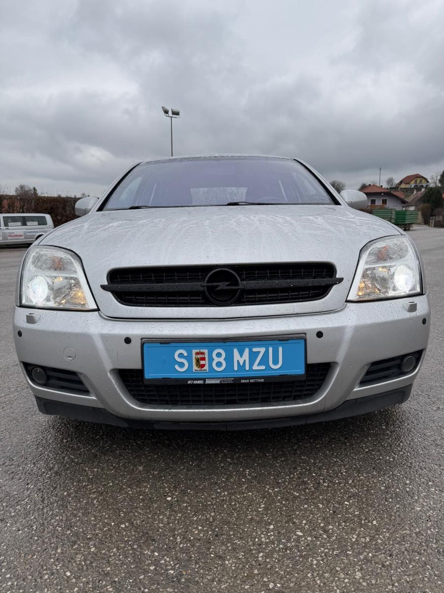 Opel Vectra 2004 — photo 11