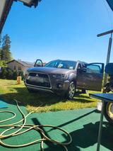 Mitsubishi Mitsubischi Outlander XL2   / 2011 - Mitsubishi Outlander aus 2011 mit Diesel-Antrieb