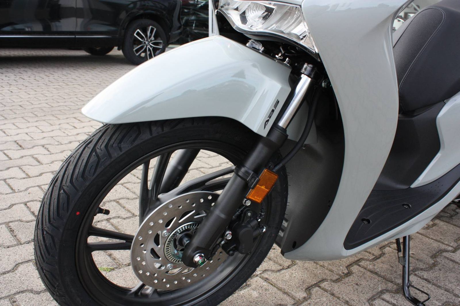 Fahrzeugabbildung Honda SH 150 i mit Smart Top Case bis 6 Jahre Garantie