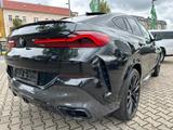BMW X6 M50 i/ H&K / HUD /3D PARK /SKY LOUNGE /LASER - gebrauchte BMW X6 aus dem Jahr 2022