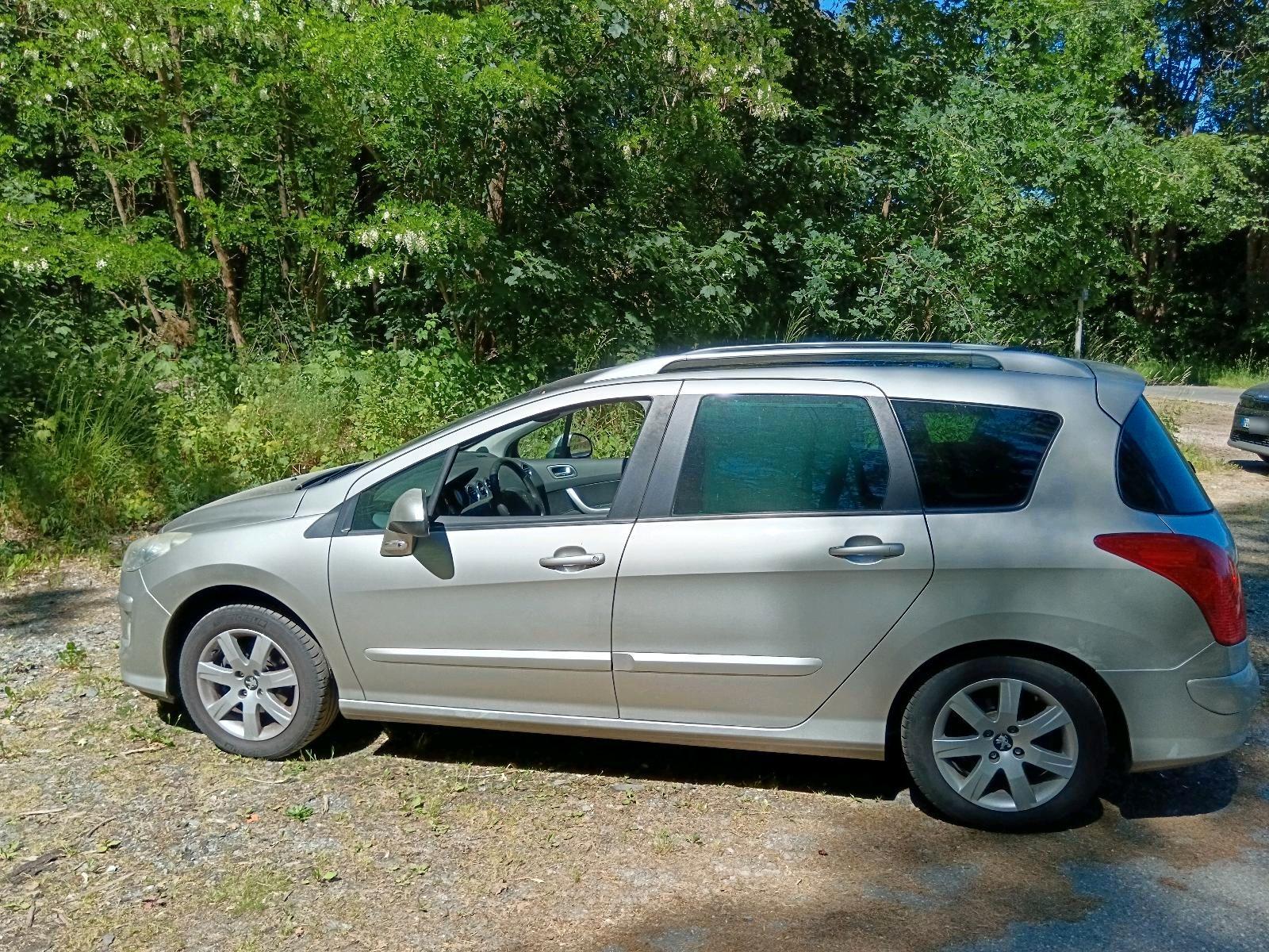 Peugeot 308 2008 — rear view