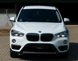 BMW X1 20i sDrive - BMW 1er Reihe mit Benzin-Antrieb: Geländewagen