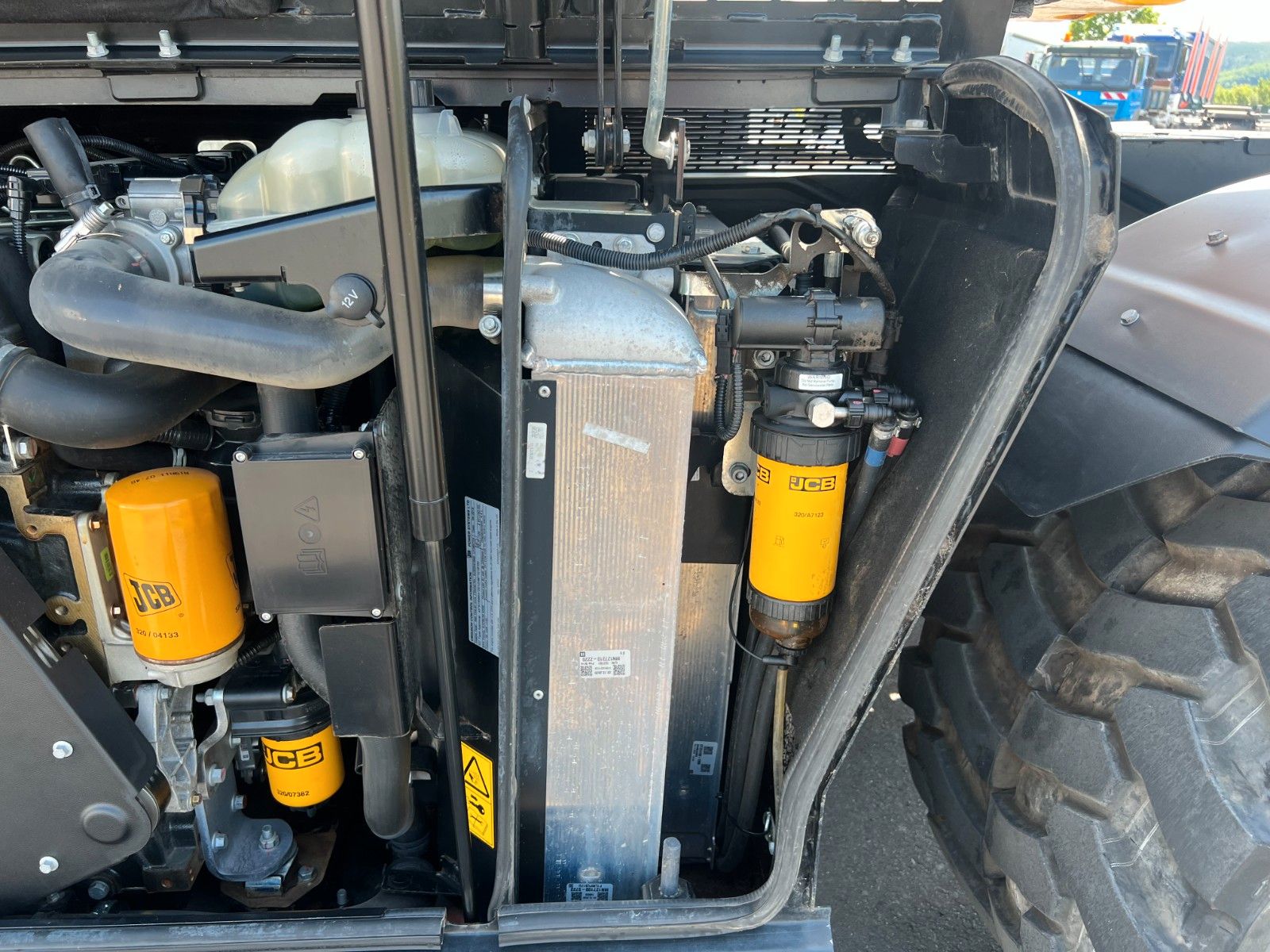 Fahrzeugabbildung JCB Hydradig 110W / Pratzen / nur 179h / Löffelpaket