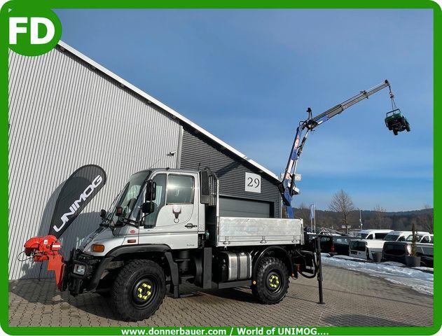 Unimog mit Kran und Wandlerschaltkupplung