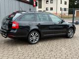 Skoda Octavia Combi Ambition - Skoda Octavia aus 2012 mit Benzin-Antrieb: Kombi