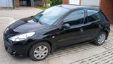 Peugeot 206+ HU bis 07/26 schwarz 55KW - Peugeot 206 in Lübeck