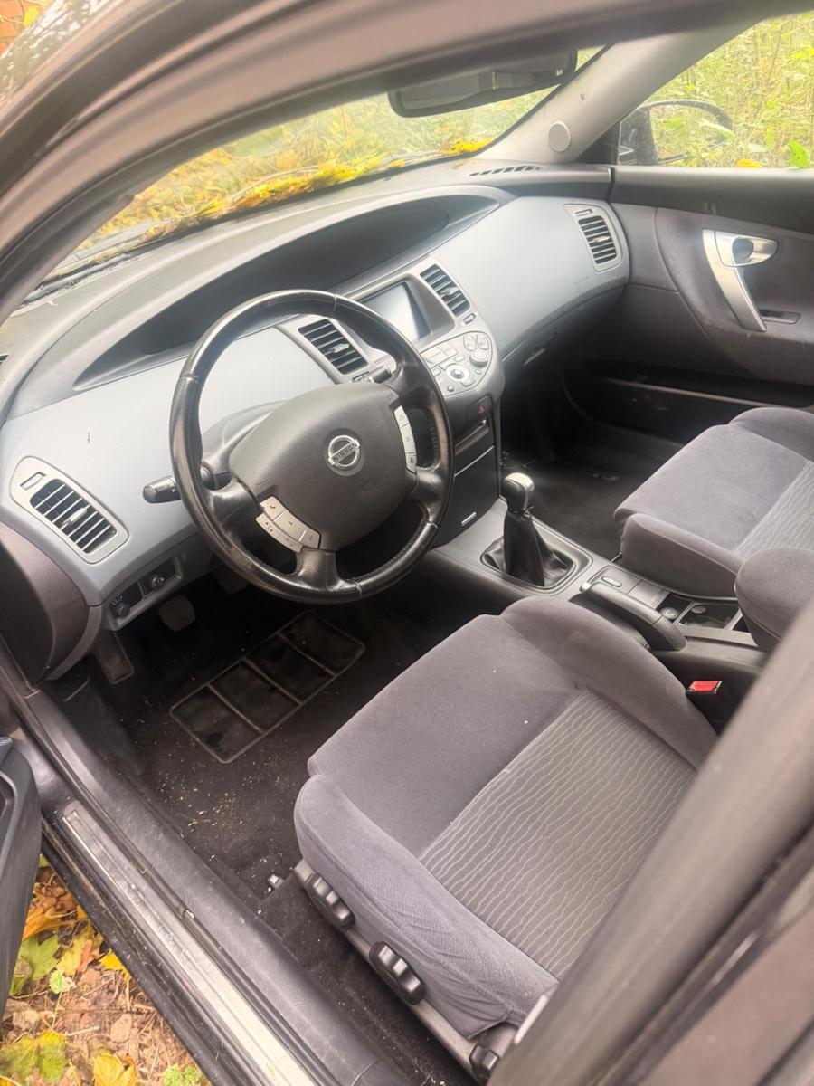 Nissan Primera 2007 — interior