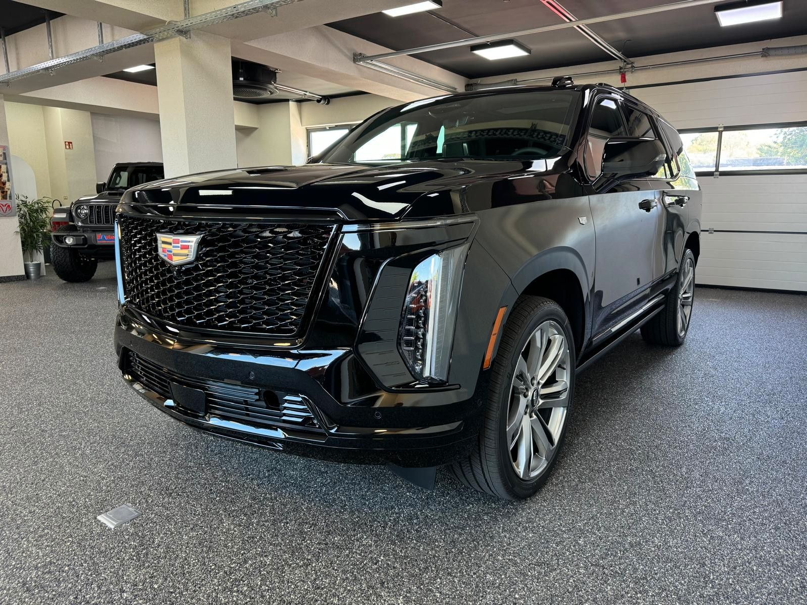 Fahrzeugabbildung Cadillac 2026 ESCALADE SPORT PLATINUM 6.2 V8-24"-ABV EXEC