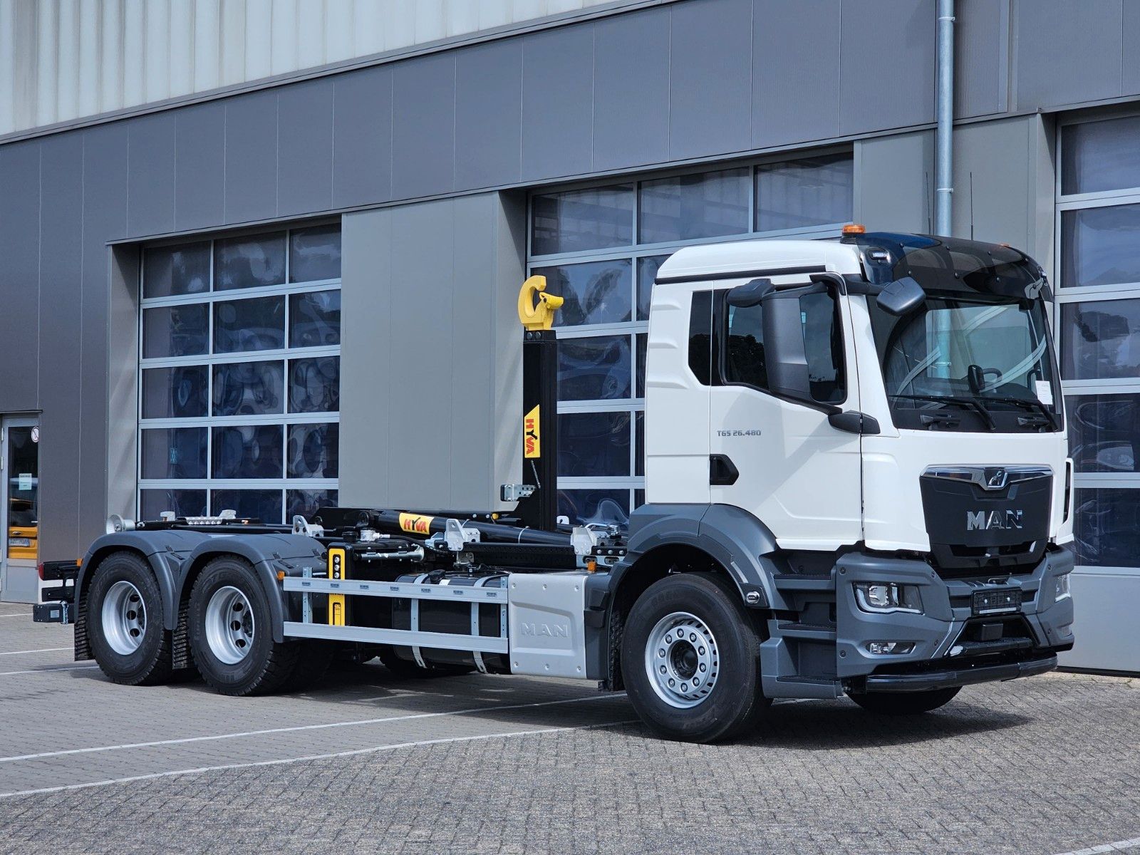 Fahrzeugabbildung MAN TGS 26.480 Abrollkipper HYVA 20-60-S / 7m Cont.