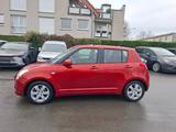 Suzuki Swift Lim. Club - Suzuki Swift mit Benzin-Antrieb: Orange