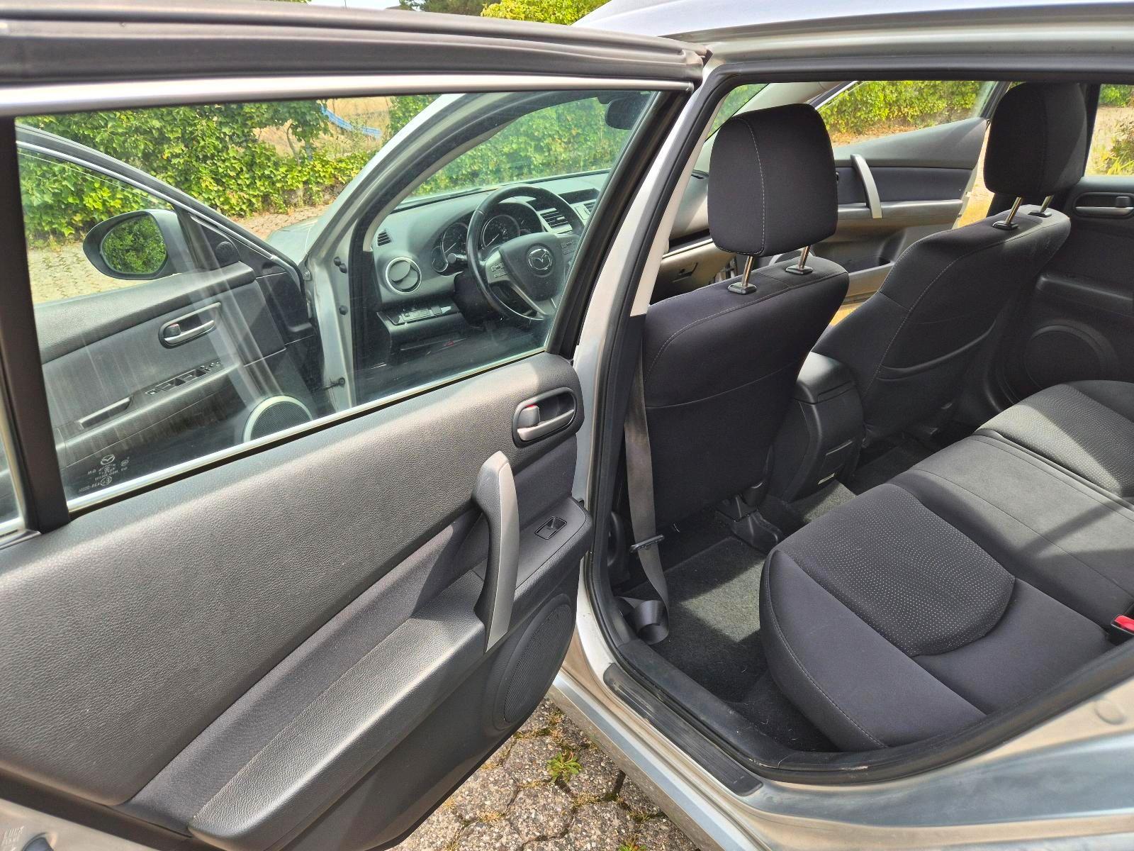 Mazda 2 2009 — photo 7