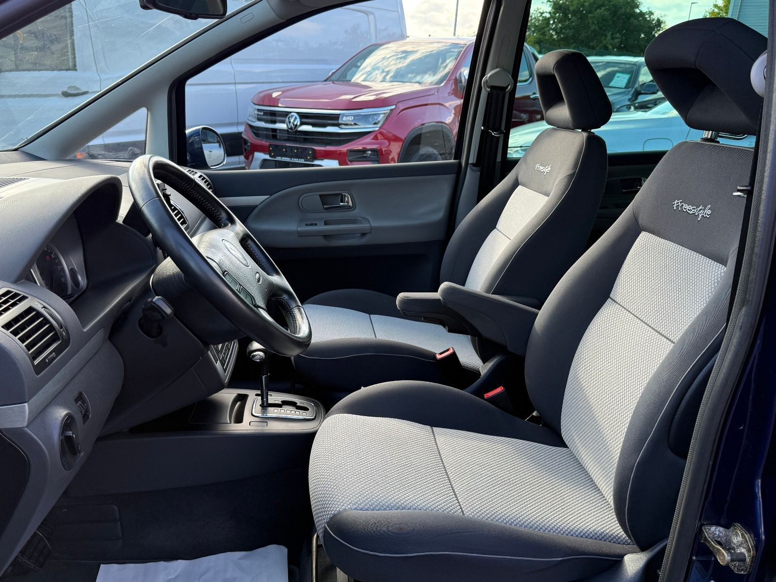 Fahrzeugabbildung Volkswagen Sharan Freestyle TSI DSG GRA Navi Xenon PDC SHZ