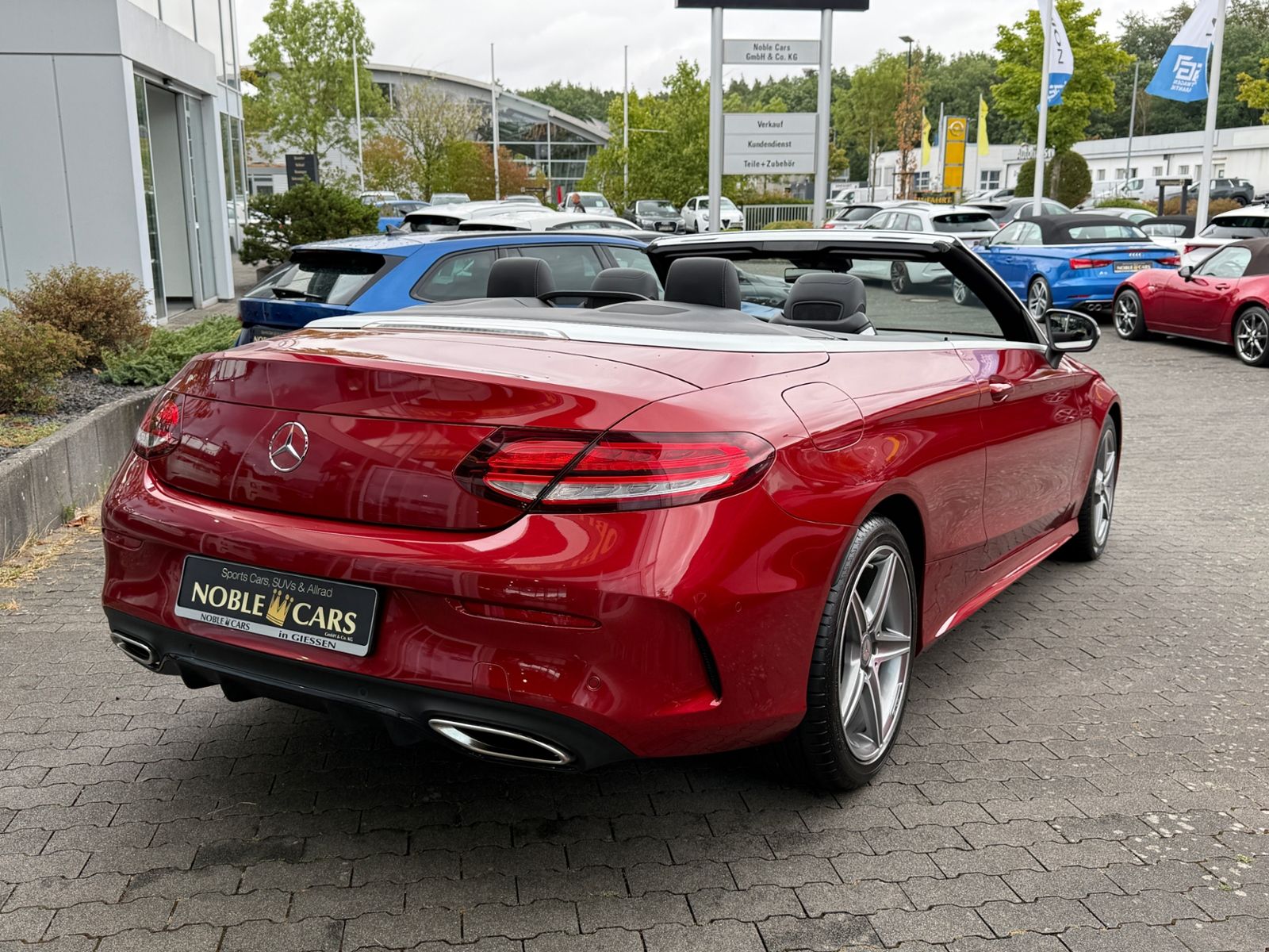 Fahrzeugabbildung Mercedes-Benz C 200 Cabrio AMG NIGHT Navi Rückfahr KAM Sounds.