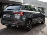Skoda KAROQ SPORTLINE 2.0 TSI DSG 4X4 DCC Kam. Navi LM - Skoda Karoq Gebrauchtwagen in Hamburg