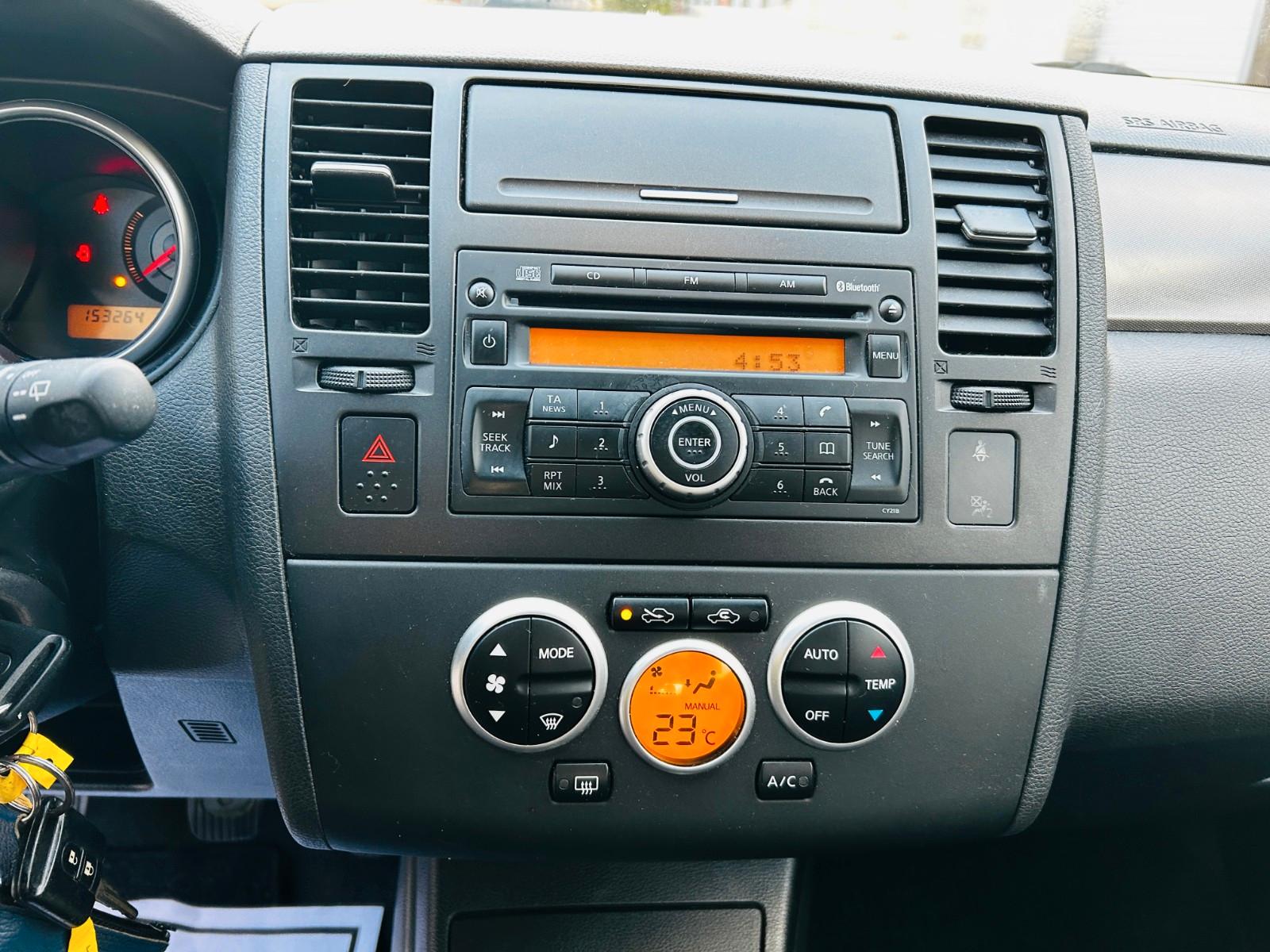 Nissan Tiida 2009 — photo 13