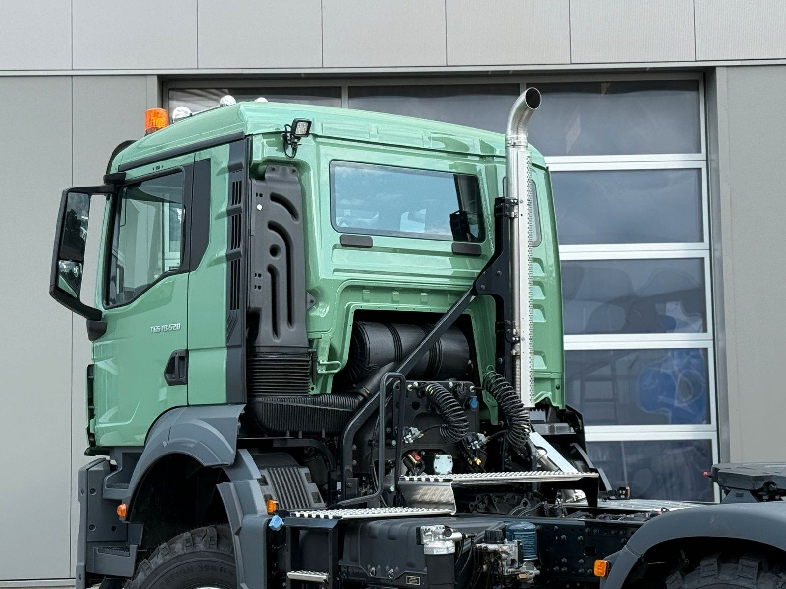 Fahrzeugabbildung MAN TGS 18.520 BL SA 4x4 mit Hydraulikvor* Einzelbe*