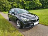 BMW 216i Active Tourer*1.HAND*PDC*ALU*KLIMA*WENIG KM - BMW 216 Active Tourer aus 2017