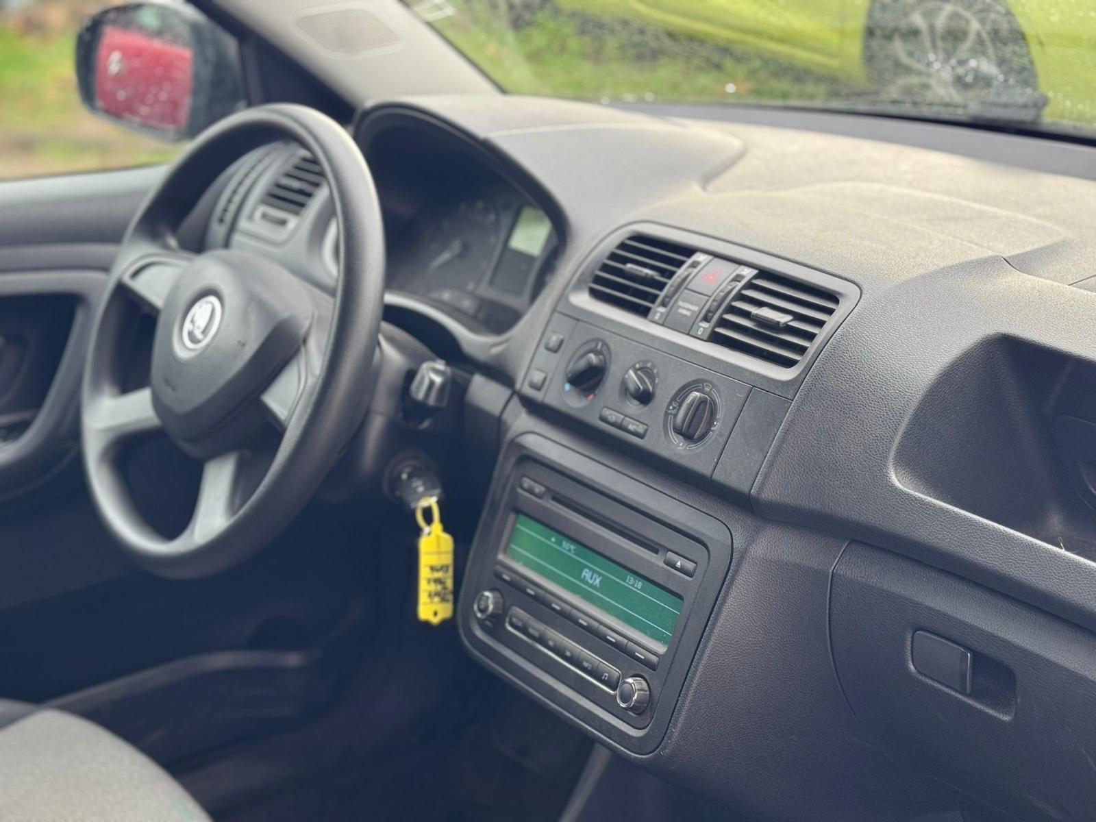 Skoda Fabia 2014 — photo 12