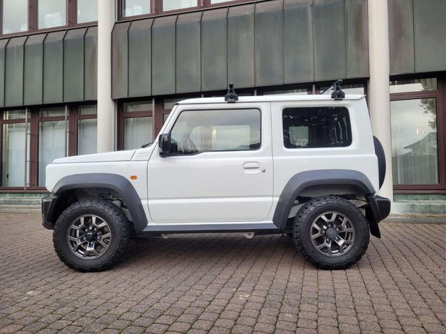 Suzuki Jimny Comfort AllGrip Navi-4 Sitzer-AHK-Temp-PDC