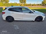 BMW M135i XDrive - weiße BMW 135