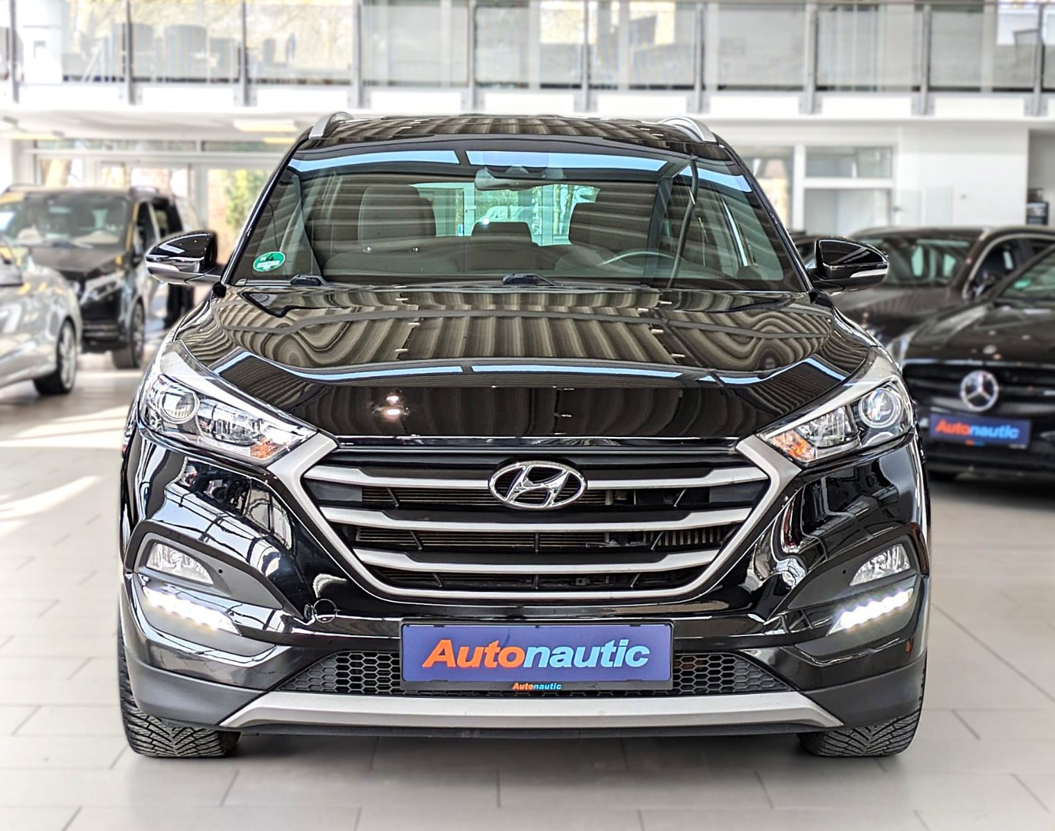 Fahrzeugabbildung Hyundai TUCSON 1.6i DTC PASSION SITZHZ ANDROID NAVI CAM