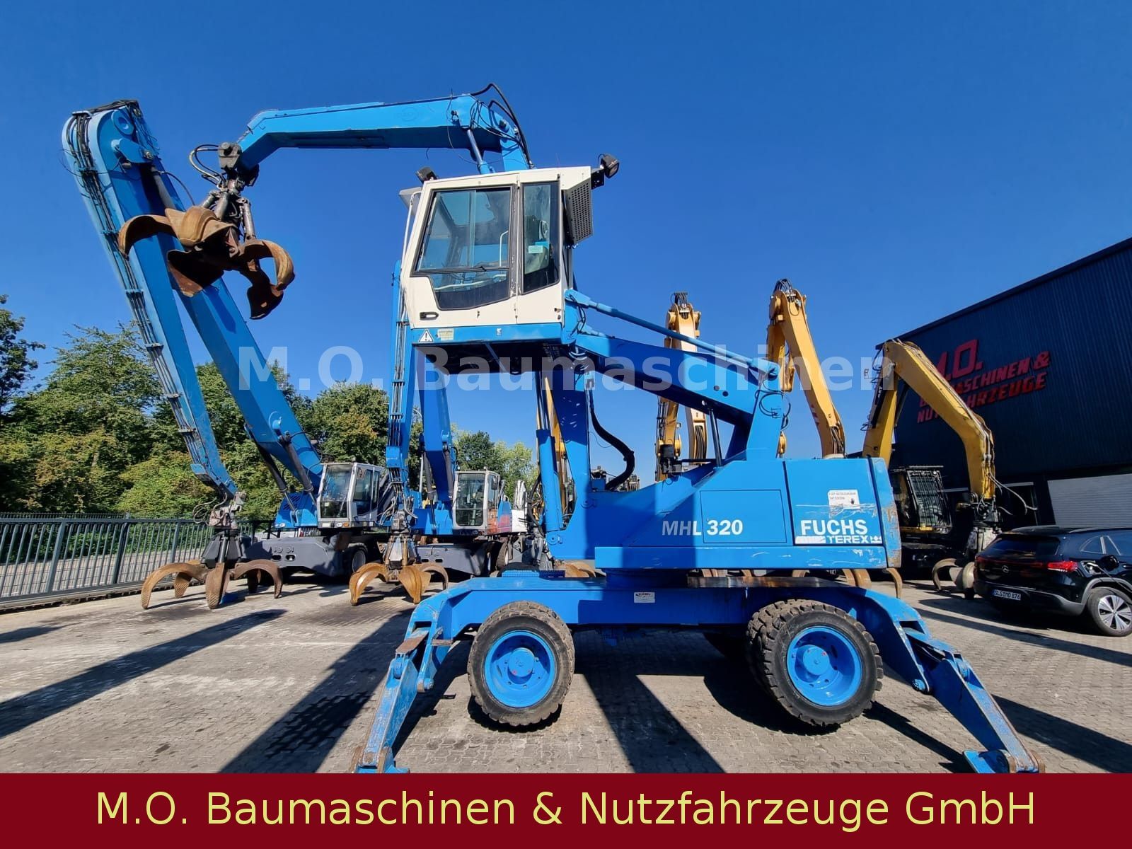 Fahrzeugabbildung Fuchs Terex MHL 320 / Polyp/ Liftkabine