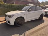 BMW X4 M40i - weiße BMW X4 M40