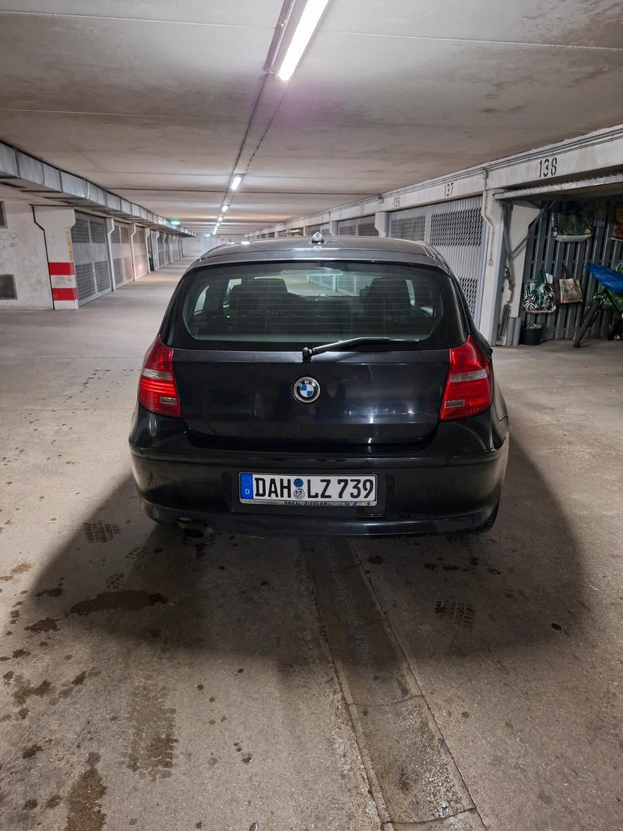 BMW 116 2010 — interior