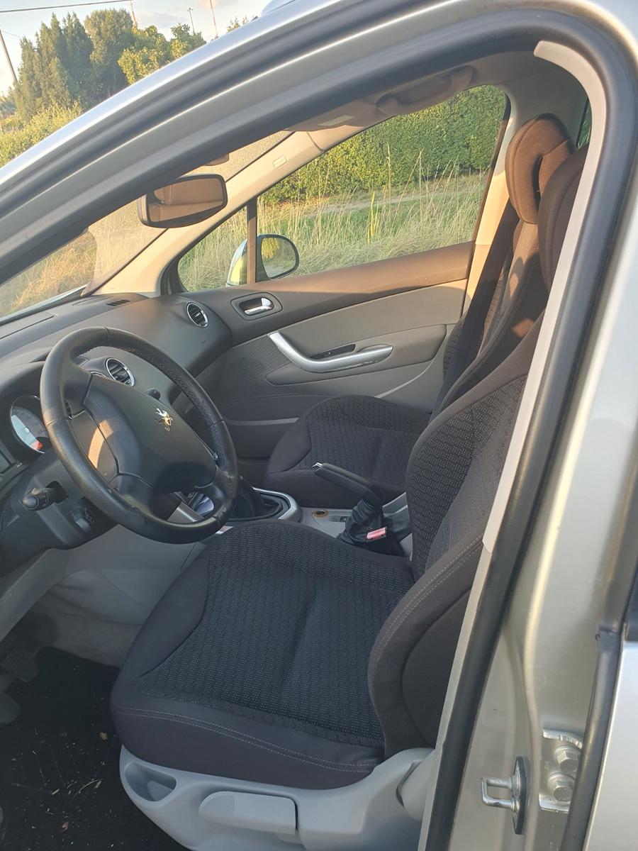 Peugeot 308 2013 — photo 8